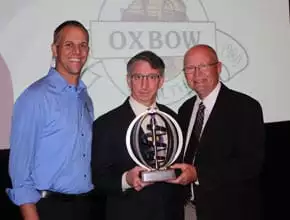 Gregory A Rich, DVM receiving an award